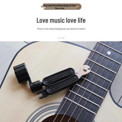 Taglia-corde, Avvolgicorde e Solleva-corde per Chitarra Tre-in-Uno con Plettro in Bachelite