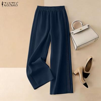 Lässige, lockere Hose mit elastischer Taille und einfarbigen Details für Damen
