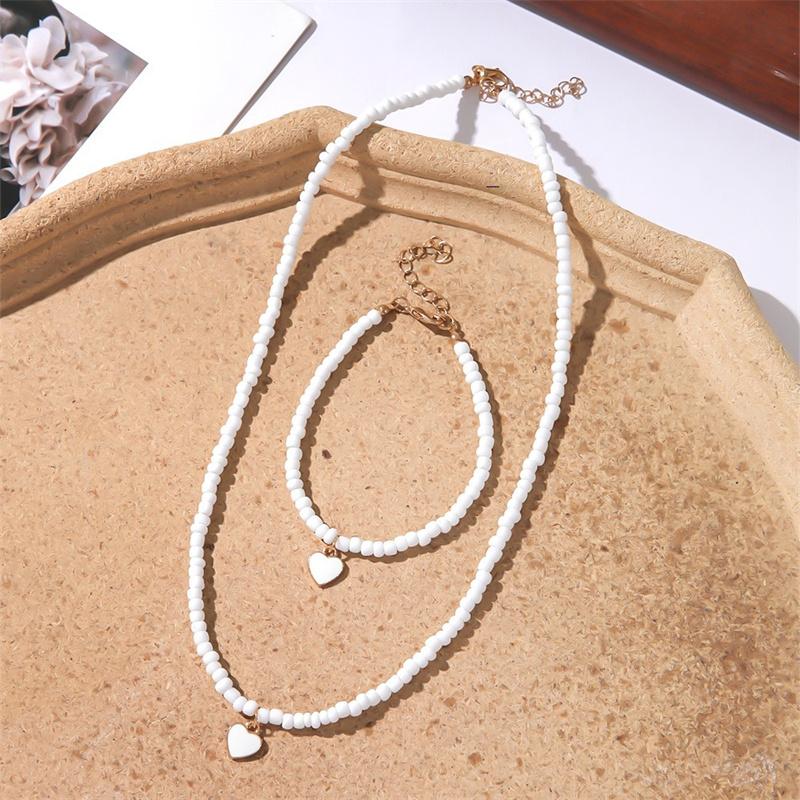 

Богемный Шик Женское Ожерелье с Подвеской-Сердцем из Бисера ручной работы - Жемчужно-белый 2 шт. Набор аксессуаров Бохо для ключицы