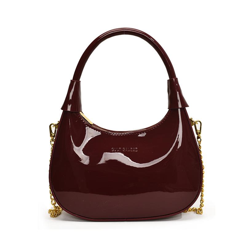 New fashion high-end texture patent leather portable crescent bag temperament light luxury versatile commuter messenger women's bag