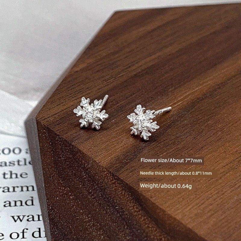 

Серьги-пусеты из стерлингового серебра S999 для женщин 2025 Новое поступление Самые продаваемые серьги-снежинки Доступная роскошь Модные серьги с задним креплением Snowflake Straight Needle