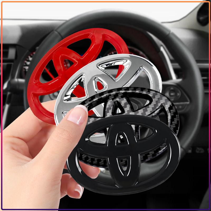 1Pcs Car Steering Wheel Emblem Badge Decal Sticker Auto Styling Decor Fit For Toyota Fortuner Chr Verso Prius Hiace Yaris Trd Corolla