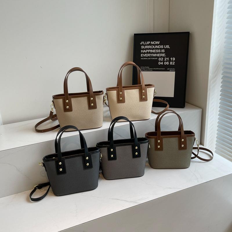 Autumn new fashionable and simple contrasting color vegetable basket bag portable shoulder oblique span trendy women's bag