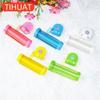 Plastic Device - A Suction Cup Press for Convenient Storage and Uniform Squeezing of Toothpaste Tubes