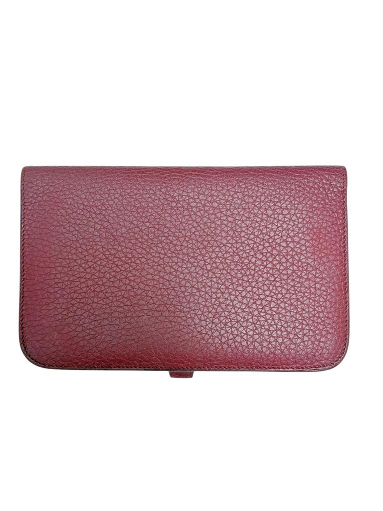 Použitá dlouhá peněženka Hermès Dogon GM v barvě vínová rubínová, stříbrné kování