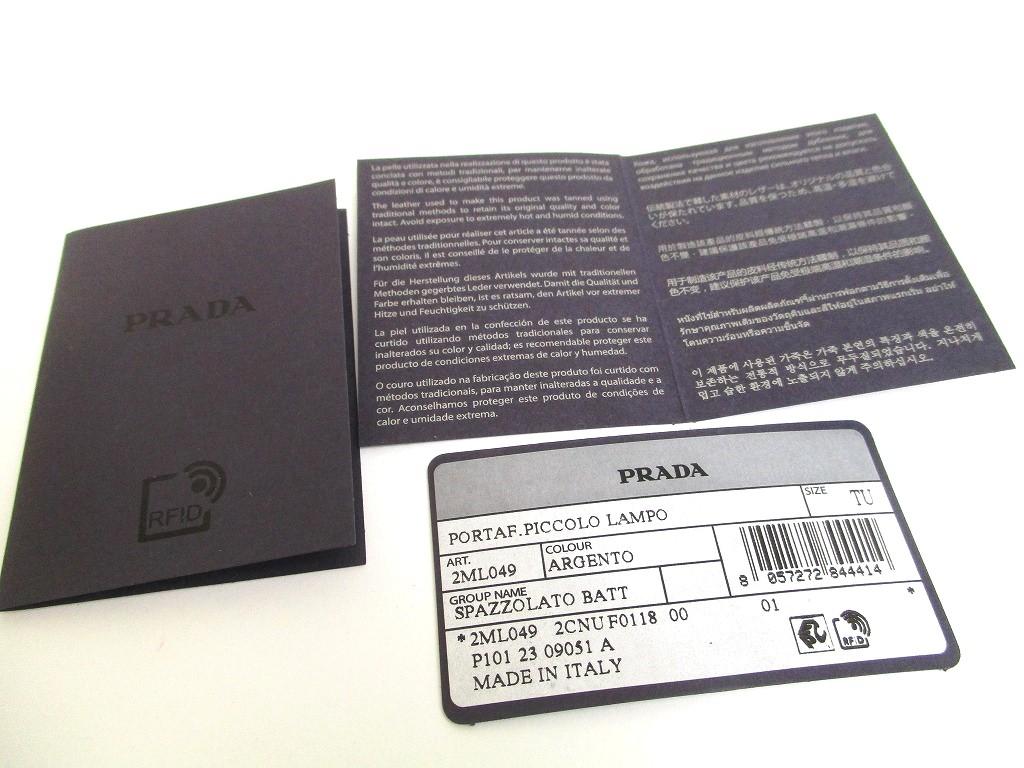 Prada Portefeuille compact à deux volets en cuir argenté et noir #a592