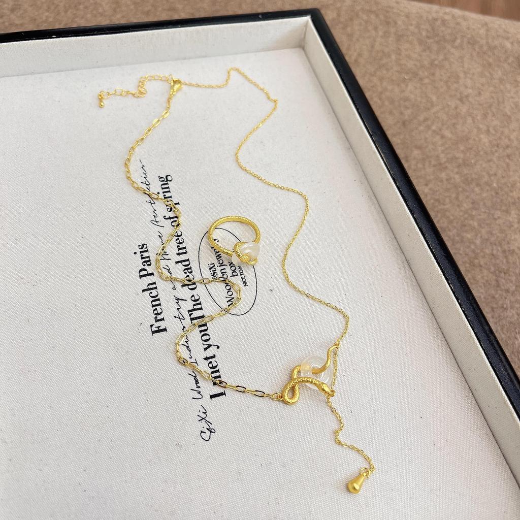 Silver Snake Peace Buckle Necklace: Elegant and Unique Zodiac-Inspired Clavicle Accessory for Women, Perfect for Autumn and Winter.