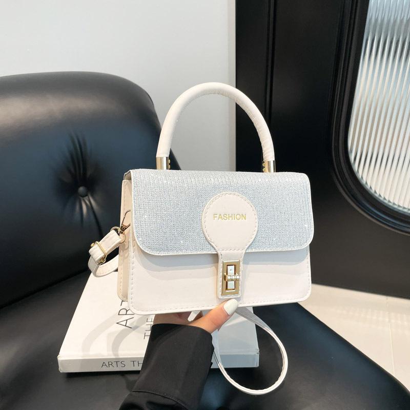 Niche lock portable small square bag women's bag 2025 summer new light luxury foreign shoulder bag commuter messenger bag