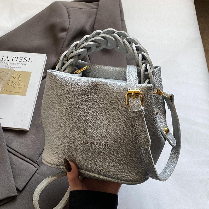 New product simple style texture fashionable portable bucket bag femininity commuting versatile casual PU messenger bag