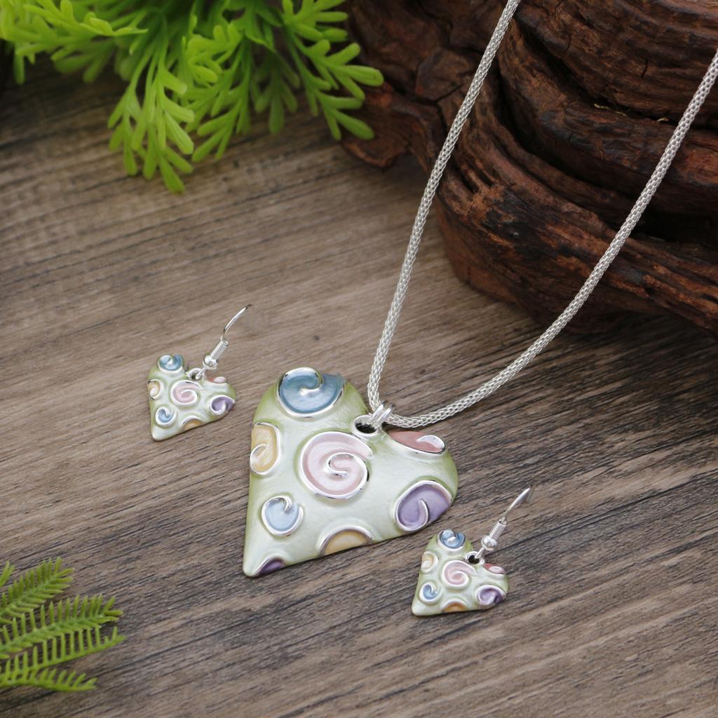 New Enamel Love Earrings Pendant Set, Women's Simple and High-end Heart-shaped Vortex Necklace.