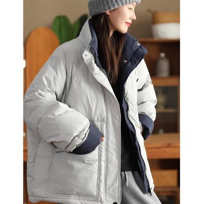In Winter, The New Korean Version of The Stand-up Collar Cotton-padded Jacket Women's Short Loose Thick Little Coat.