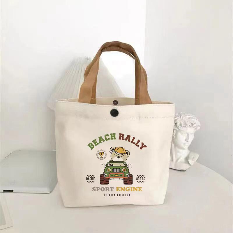 

Cute Bear Small Versatile Handbag Mini Canvas Bag Female Student Lunch Box Bag Simple Tote Bag Office Worker Lunch Bag