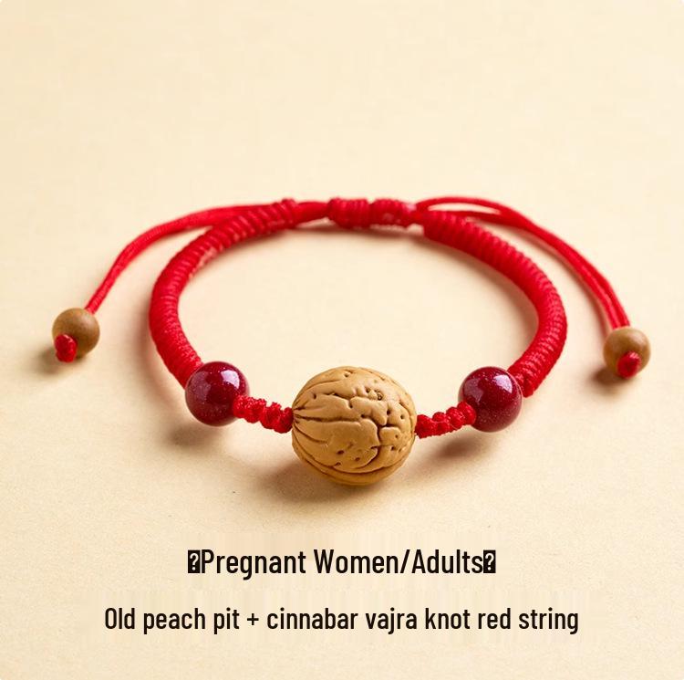 Wild Peach Wood Baby Amulet Bracelet: Soothing Red String with Peach Pit for Benmingnian & Pregnant Women.