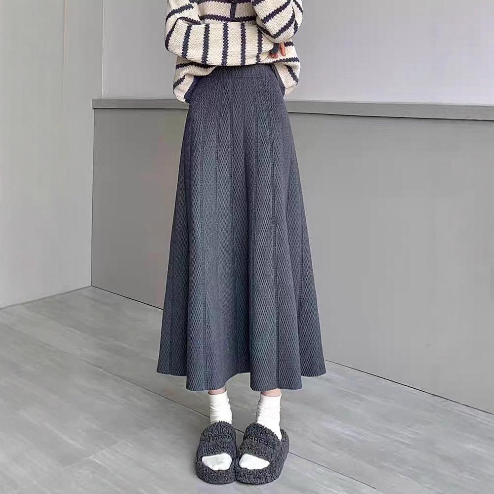 European, American autumn and winter new solid color elastic waist design sense texture medium and long versatile skirt foreign style knitted skirt