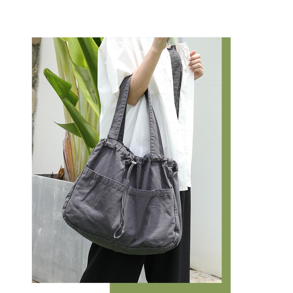 IELGY Japanese casual drawstring bundle handbag, retro washed canvas fashionable solid color shoulder women's bag