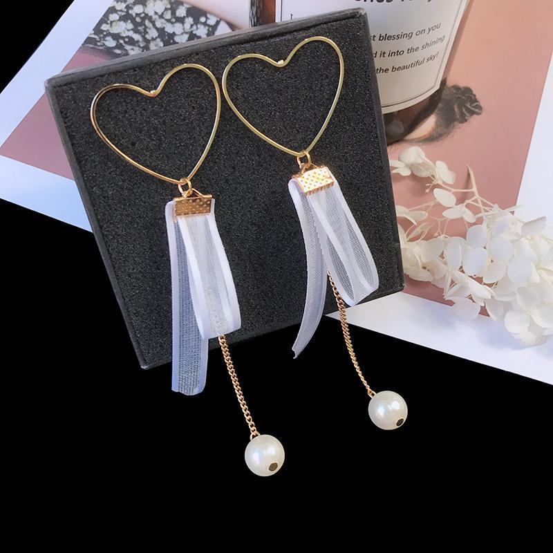 

Серьги-кисточки из ткани с цветами феи, с бантом из стразов и жемчужными гвоздиками