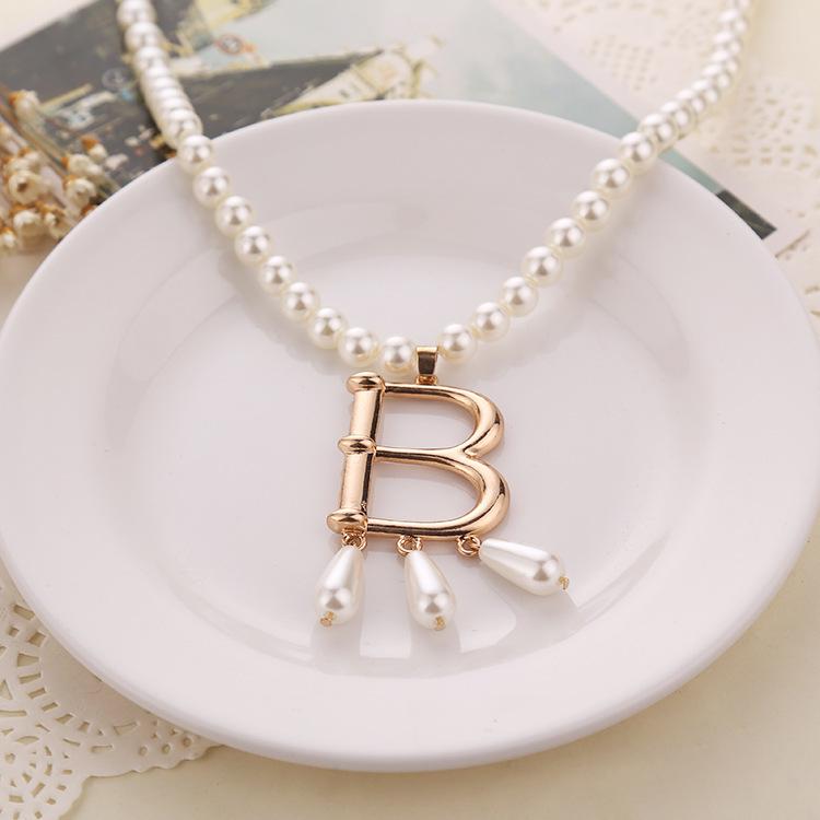 Fashion pearl necklace, creative sweater chain, letter pendant, European and American jewelry