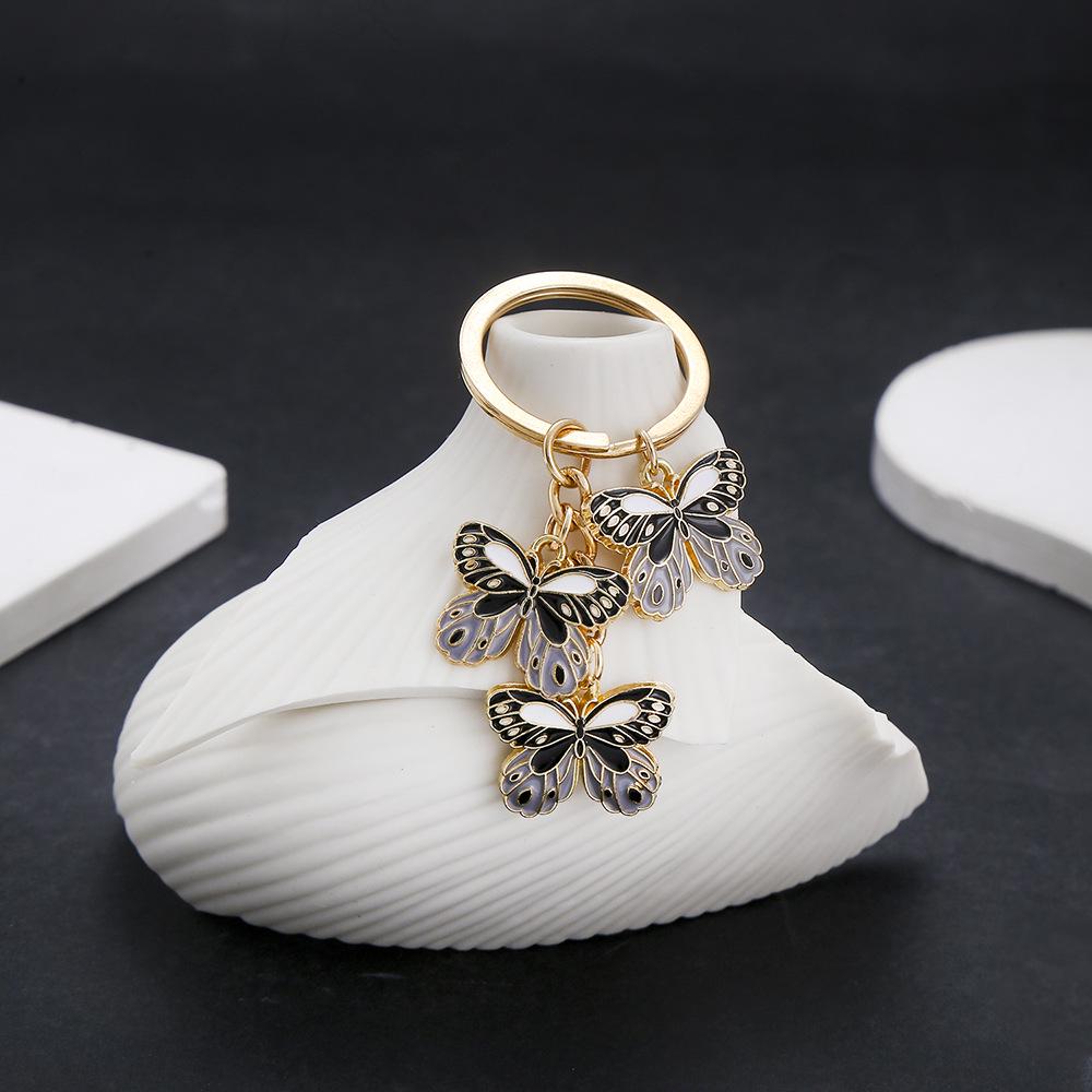 Cartoon Black Butterfly Drip Oil Keychain Metal Pendant