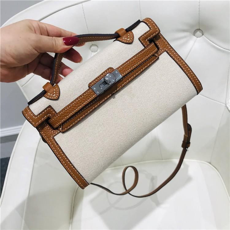 Nowej generacji płócienna torebka kopertówka ze skóry krowiej damska torba na ramię ukośny mała torba torba startowa