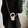 Stylish and Compact Mini Imitation Pearl Hollow Women's Change Mouth Red Envelope Spring New Shoulder Messenger Bag