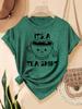 Es ist ein T-Shirt für Damen - Süße Wortspiel-Grafik, Lässiges Lila Oberteil