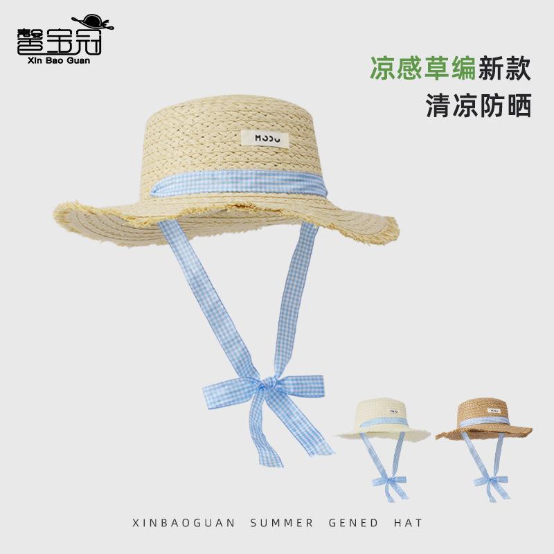 Idyllic straw hat summer seaside vacation sun protection sun hat children outdoor travel atmosphere sun hat