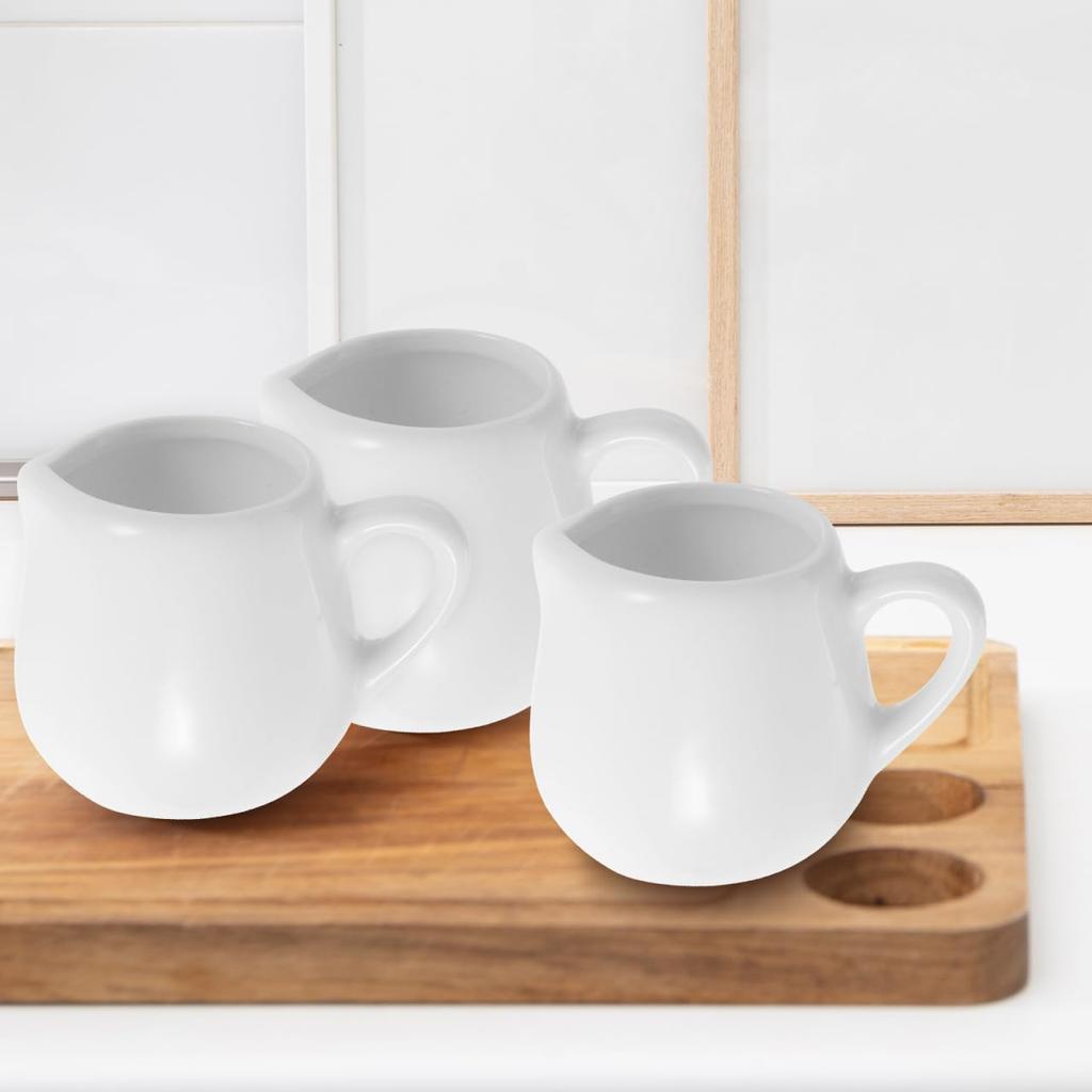Luxshiny 6-Piece Ceramic Mini Milk Pitcher Set, also usable as a small sauce cup and coffee creamer, practical milk cup set for kitchen use.