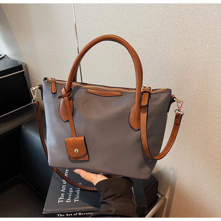 Nylon cloth bag women's large-capacity autumn and winter versatile messenger bag textured portable commuter bucket bag