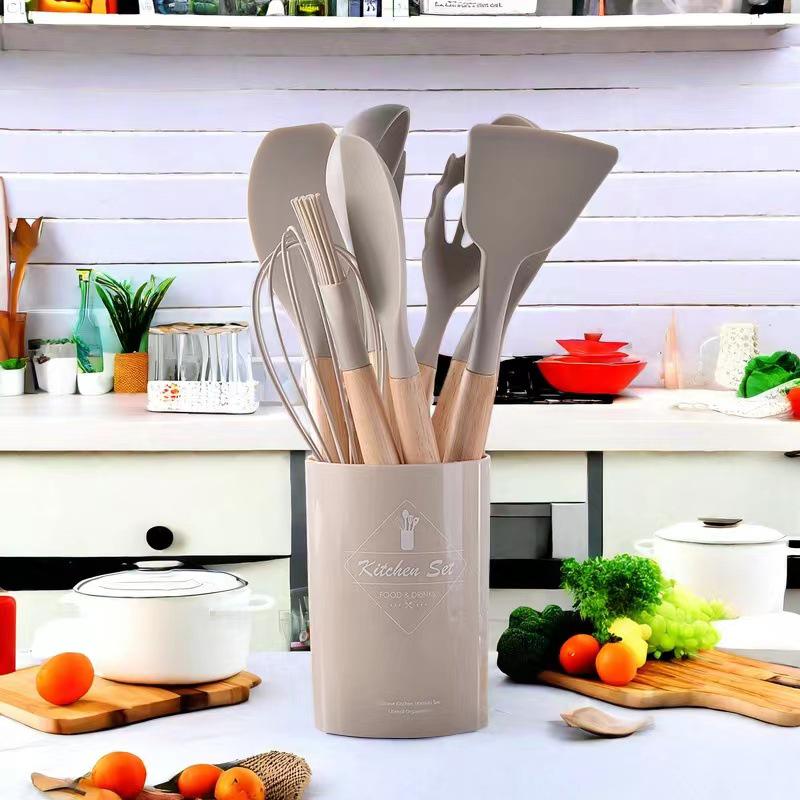 12-Piece Silicone Cookware Set with Wooden Handles - Non-stick, High-Temperature Resistant, Includes Spatula and Soup Ladle.