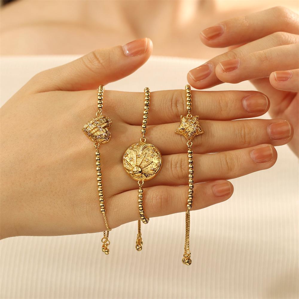 Měděný zirkonový náramek Hvězdná obloha Slunce se srdíčkem a kulatými korálky