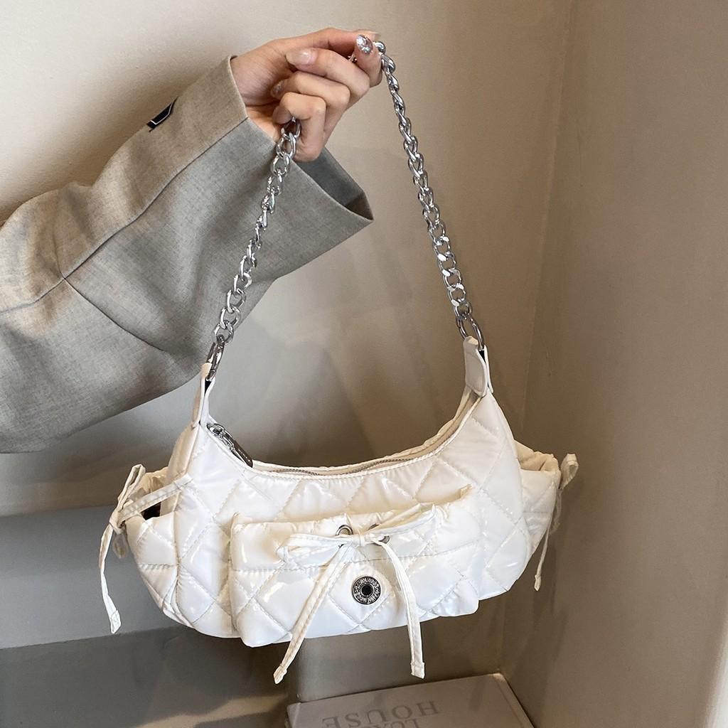 Stylish Medium Size Seashell Shape Saddle Bag With Chain Strap In Black Color