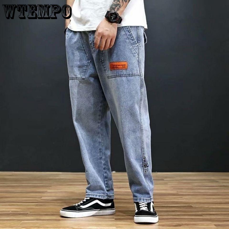 

Джинсы Мужчины Loose прямой ногой Гарем Брюки Молодежи Упругий Waist Красивый Широкие ноги были тонкими и большого размера