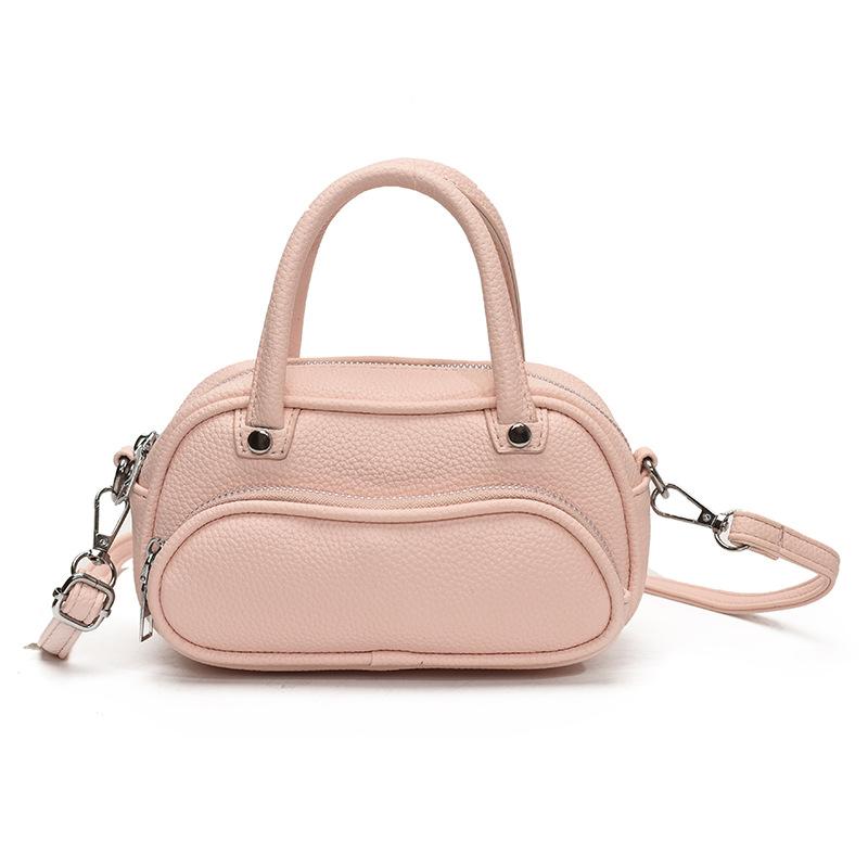 Korean version of trendy simple lychee pattern cream portable pillow bag women's leisure commuting versatile high-end messenger bag