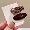 Korean Leopard Print Pearl Duckbill Hair Clip - Fashionable and Versatile Hair Accessory.