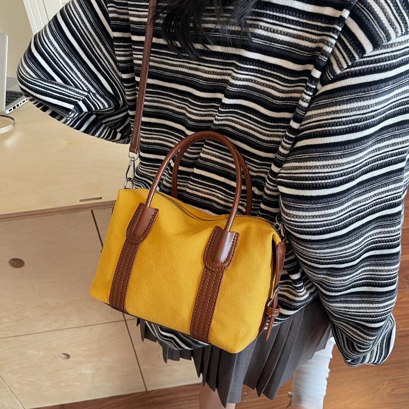 Classic Canvas Duffel Bag with Leather Trim and Adjustable Strap Perfect for Travel and Everyday Use