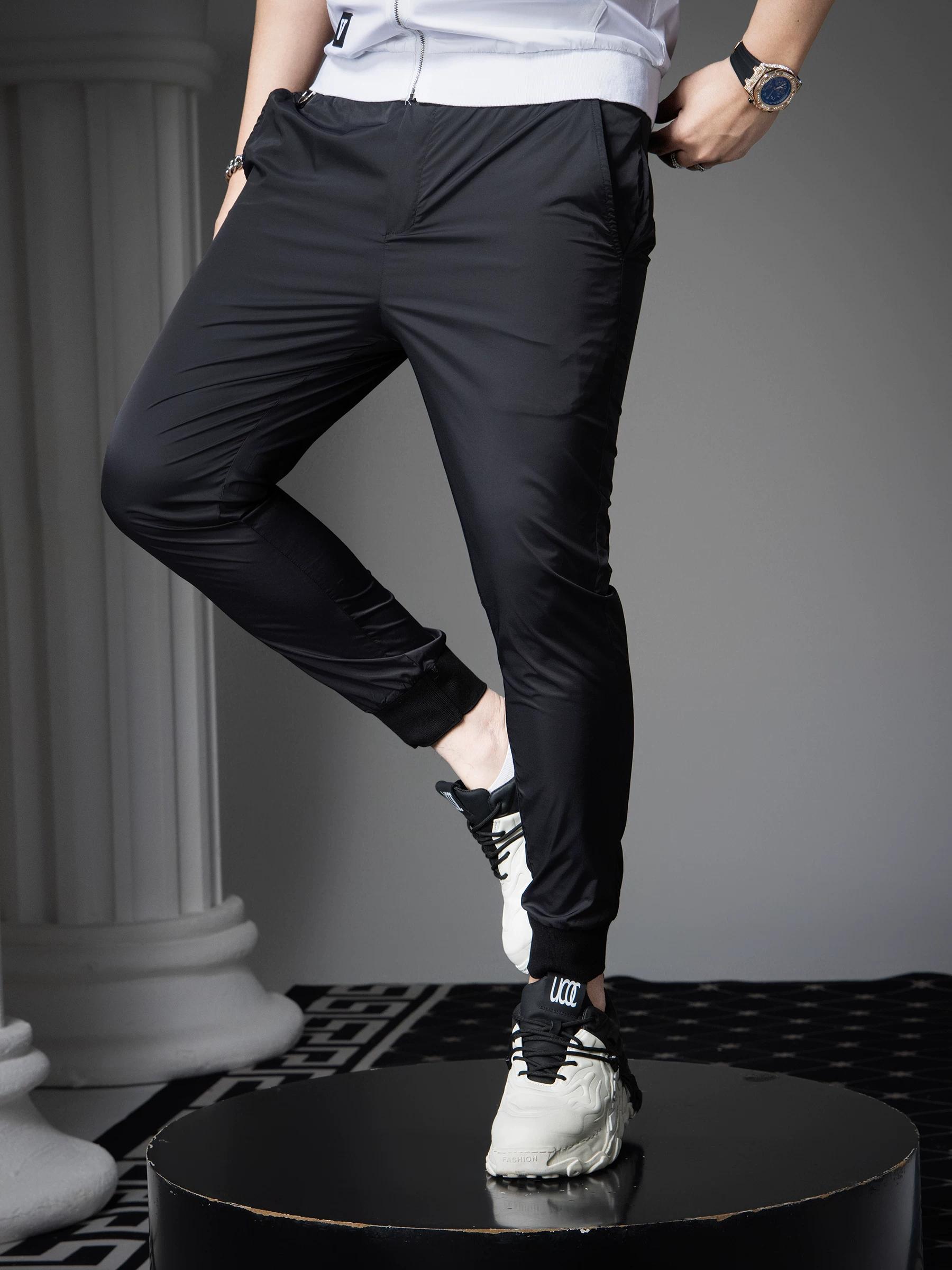 

Ozhouzhan Trendy Solid Quick-Drying Casual Trousers Men s 2025 New Summer Trendy Brand Slim fit Thin Ankle-Tied Pants 3XL чёрный