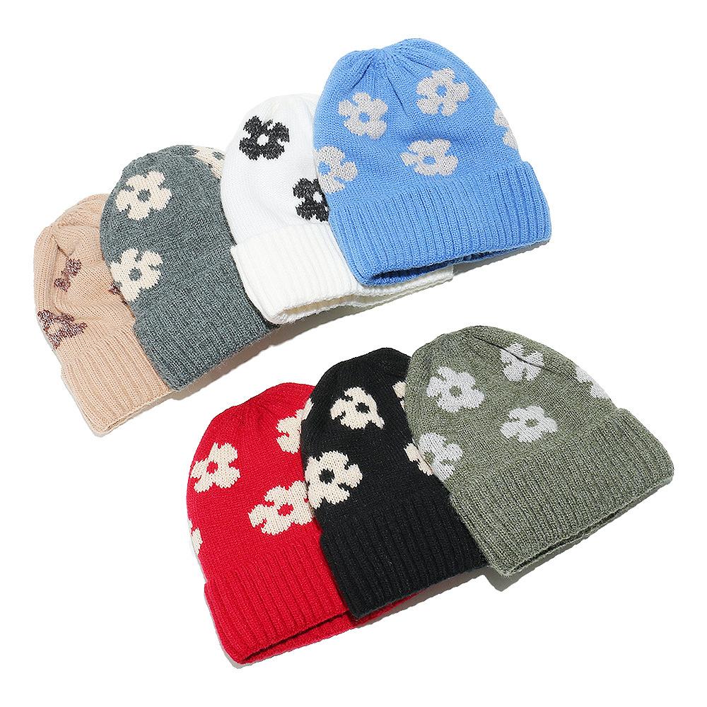2025 winter new wool hats for men and women, cold-proof and warm cold hats, piled thickened pullover hats, flower knitted hats for women