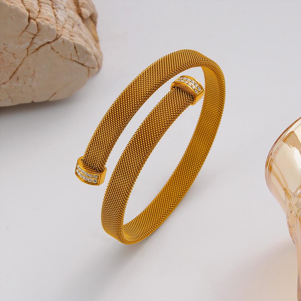 European Retro 18K Gold-Plated Titanium Steel Openwork Mesh Bangle 2026