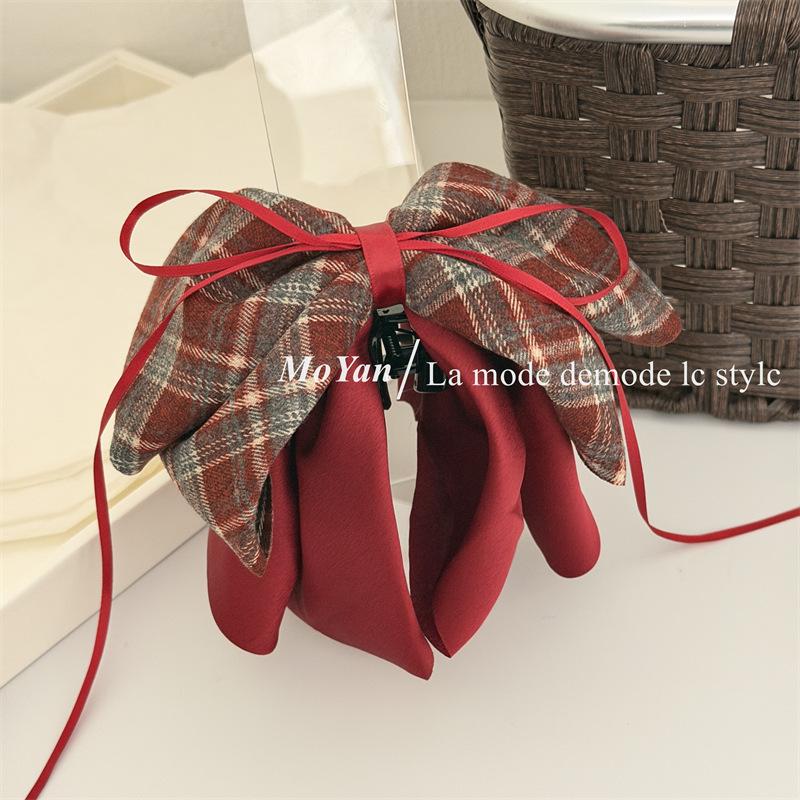 Embroidered Satin Bow Ponytail Clip - A Fashionable and Versatile Hairpin for Updos.