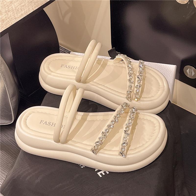 Thick-soled stepping on shit feels two wear cool slippers women's 2025 summer new thin-strapped rhinestone one-word drag Roman wind beach shoes