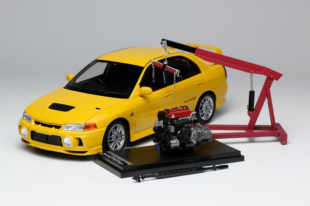 FREESTYLE MOTORHELIX Scale Mitsubishi Lancer Evolution EVO IV Dandelion Yellow Finished Model M84006 1/18