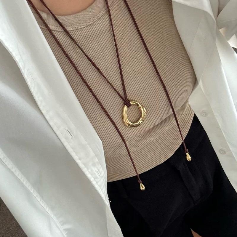 Women's Black Rope Pendant Necklace - Dong Jie Metal Circle, Long Sweater Chain, Vintage Luxury Style
