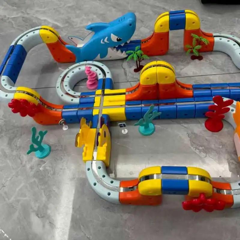 Neue Ozean-Serie Kinder Elektrische Magnetische Schwebebahn Schienen Würfel Bausteine 3D Junge DIY Magnetische Montage Spielzeug Auto