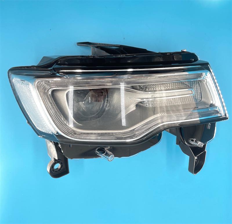 Fits 2014-2018 Jeep Grand Cherokee: OEM Headlight Half Assembly with Low Beam Lighting