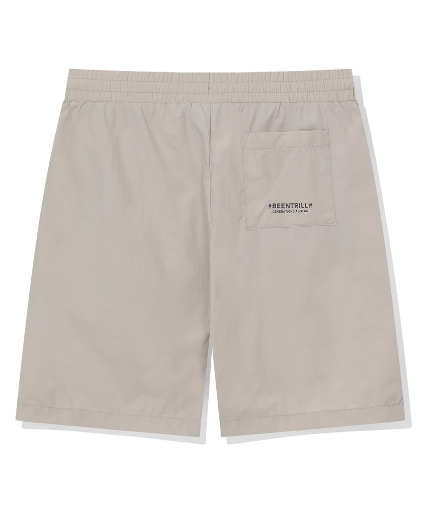 Vintril Essential Small Logo Woven Shorts (Beige)
