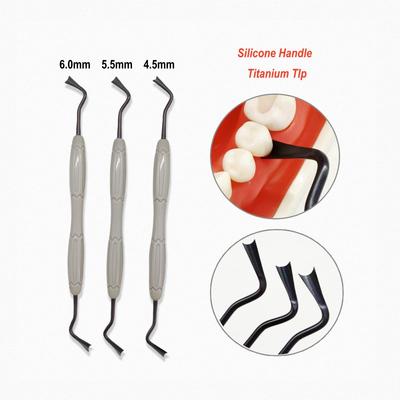 Impianto dentale in titanio Retrazione gengivale Retrattore gengivale Manico in silicone Separatore gengivale dentale Strumento chirurgico di isolamento