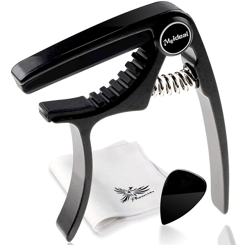 

Phoenix capo tasto one touch [ ukulele exclusive ] capo solo Concert/Pick/Fiber cloth/Long term warranty 4-piece set