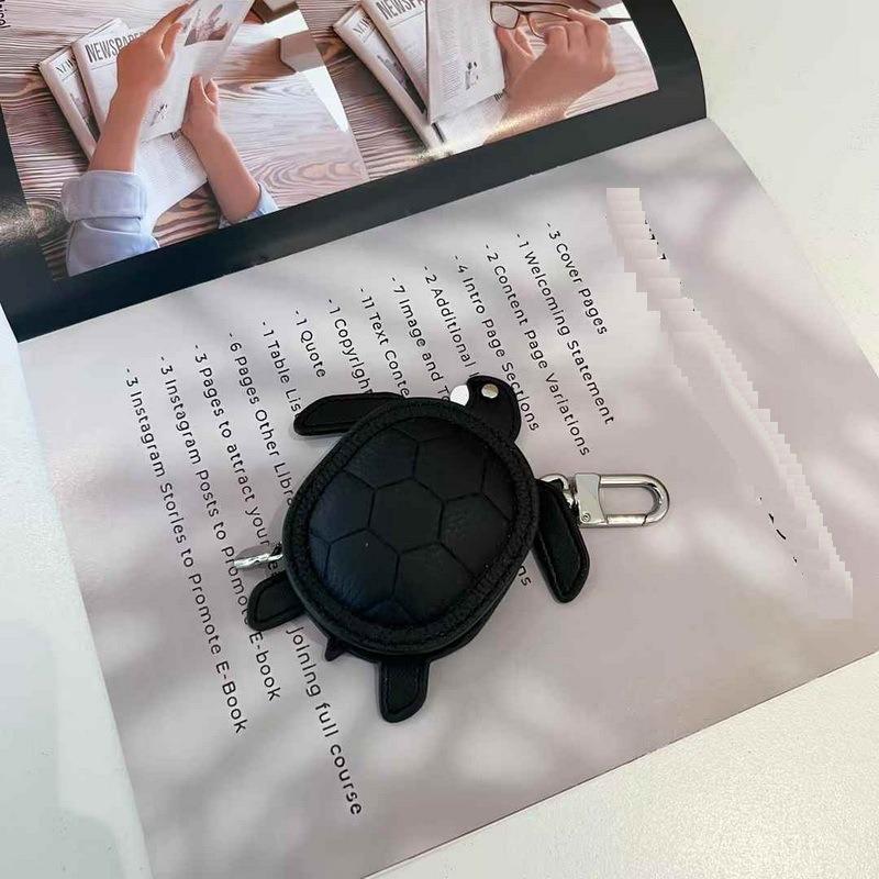 2025 New Leather Pendant Head Layer Leather Mini Earphone Bag Turtle Pendant Wallet Cross Border