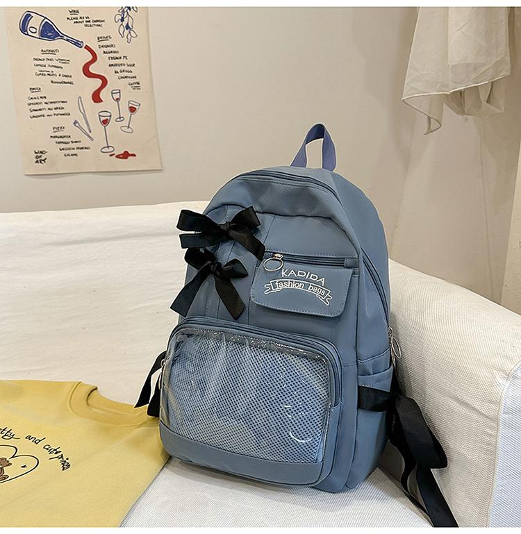 Bow schoolbag female corduroy junior high school students primary school students Internet celebrity backpack large capacity niche backpack