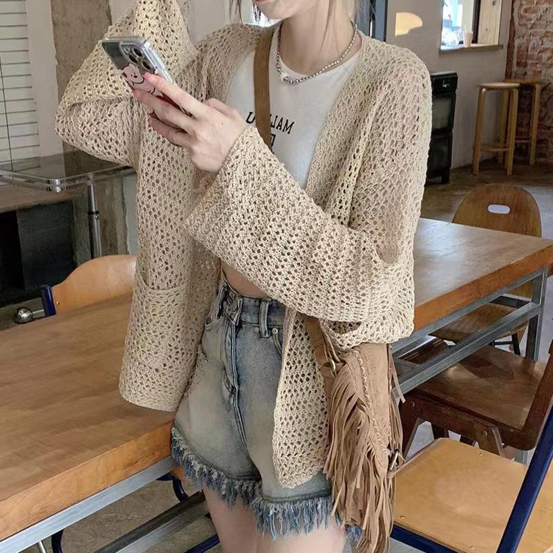 Summer women's thin hollow pocket knitted cardigan outer wear design sense niche hot girl sunscreen shawl top coat